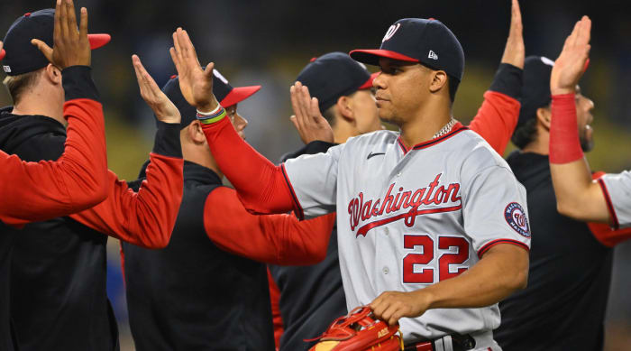 Juan Soto congratulates Nationals teammates after a win.